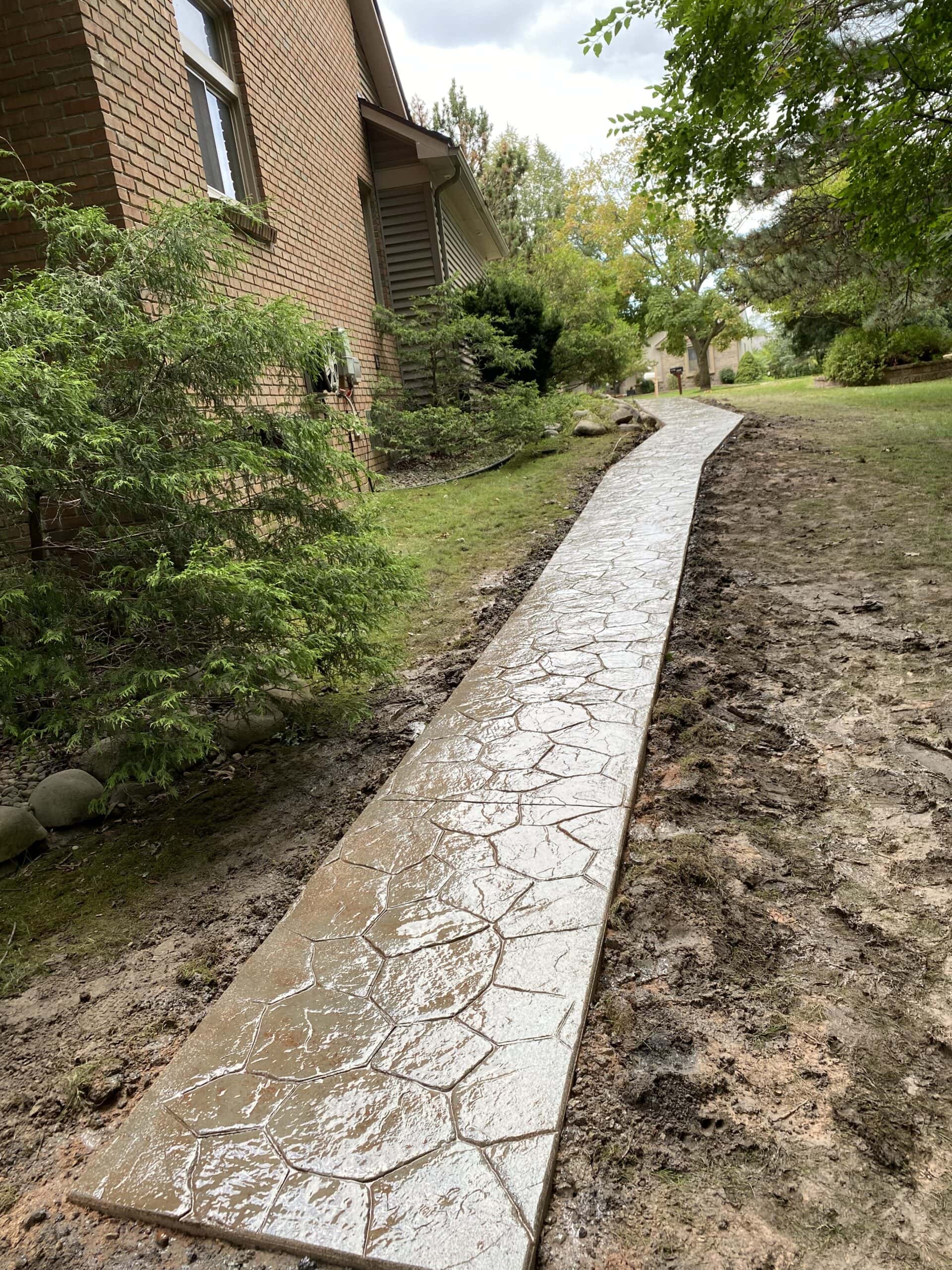 How We Build Patios That Handle Livonia’s Soil and Climate